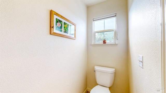 bathroom featuring toilet