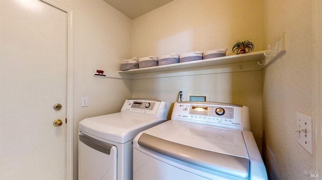 washroom with washer and clothes dryer