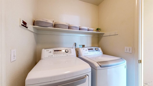 laundry area featuring separate washer and dryer