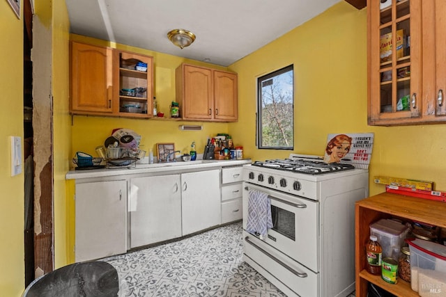 kitchen featuring white gas range oven