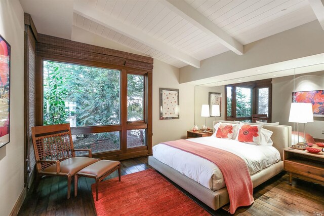 bedroom featuring multiple windows and hardwood / wood-style flooring