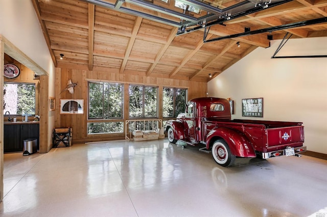 garage with wooden walls and wooden ceiling