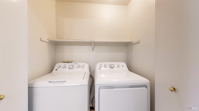 clothes washing area with independent washer and dryer