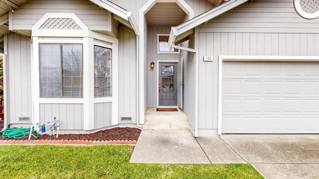 view of exterior entry featuring a garage