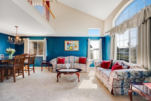 living area with high vaulted ceiling, baseboards, a chandelier, and carpet flooring