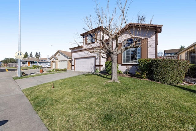 view of front facade with a garage, concrete driveway, and a front lawn