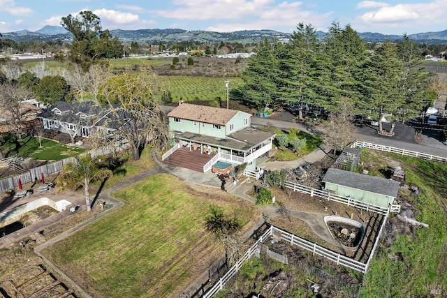 drone / aerial view featuring a mountain view