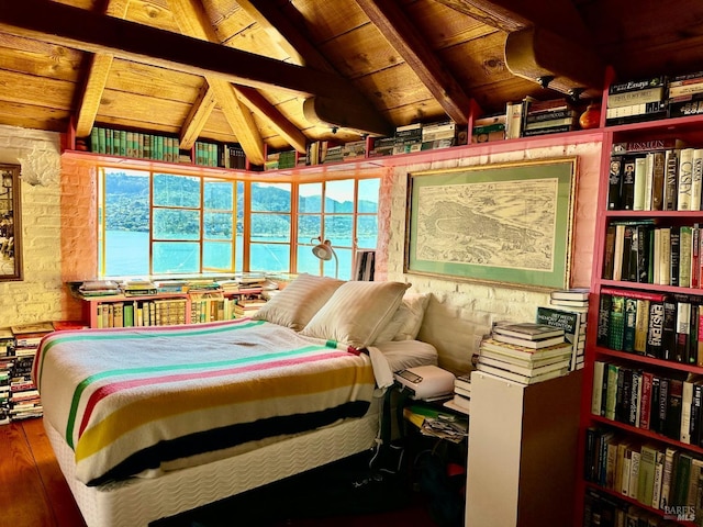 bedroom featuring hardwood / wood-style flooring, vaulted ceiling with beams, and wooden ceiling