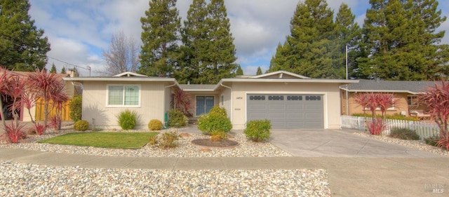 single story home with a garage