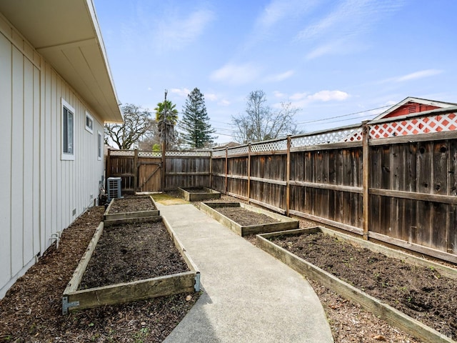 view of yard featuring central AC