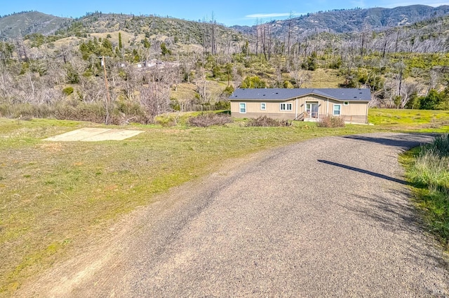 exterior space featuring a mountain view