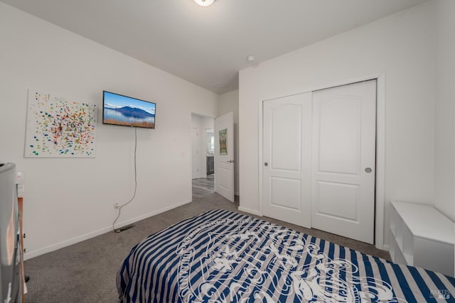 bedroom featuring a closet and carpet