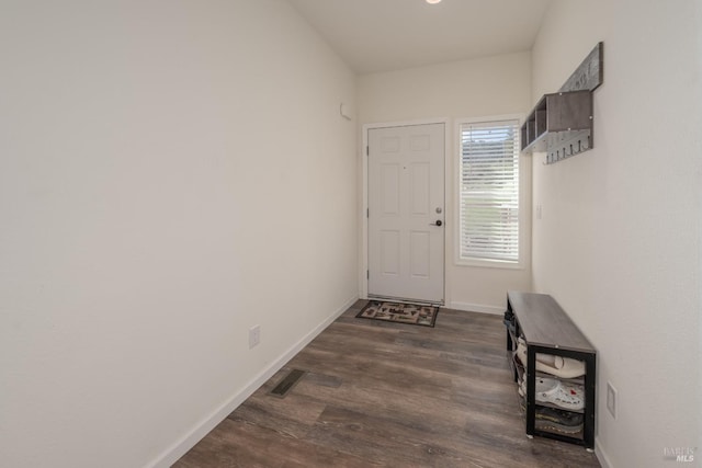 doorway to outside with dark hardwood / wood-style flooring