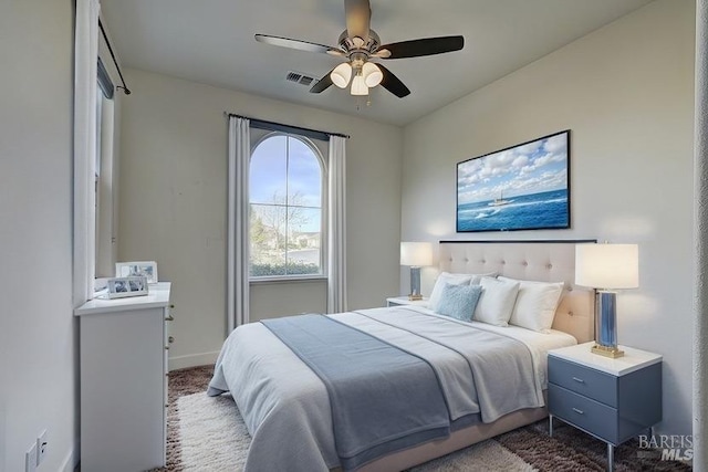 carpeted bedroom with ceiling fan