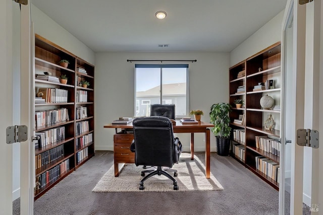 view of carpeted office space