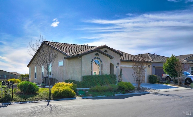 view of front of property featuring a garage