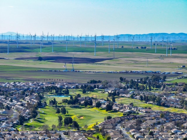 birds eye view of property with a mountain view