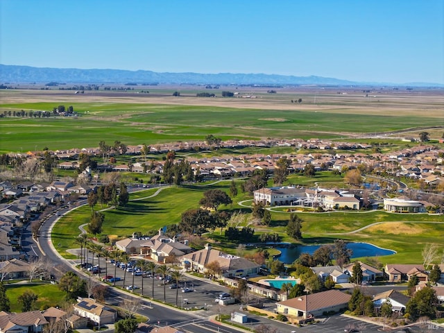 bird's eye view with a water and mountain view