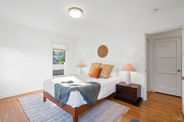 bedroom with light hardwood / wood-style flooring