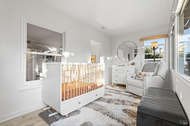 bedroom with light wood-type flooring