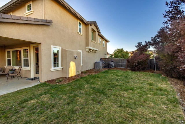 exterior space featuring cooling unit and a patio