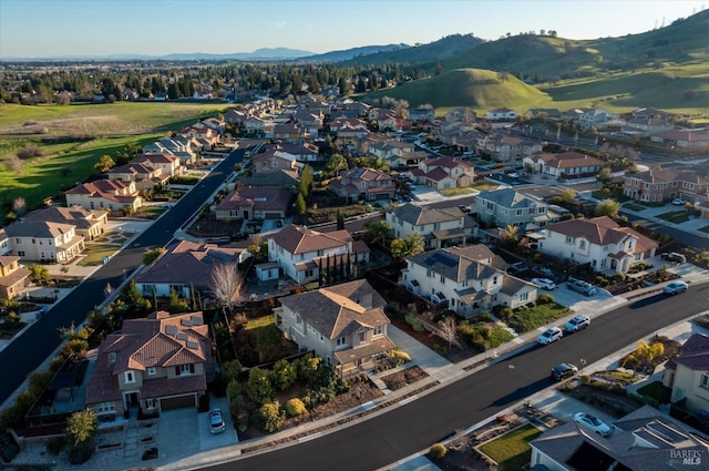 drone / aerial view featuring a mountain view