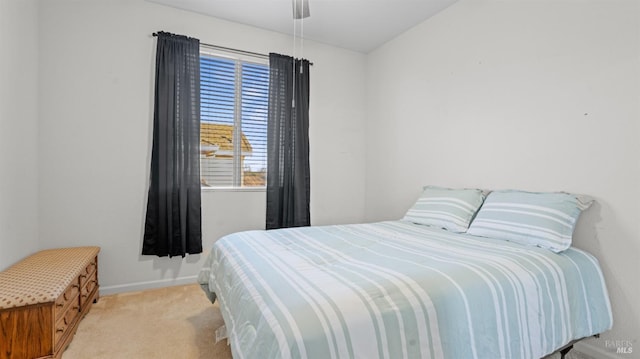 bedroom with light colored carpet