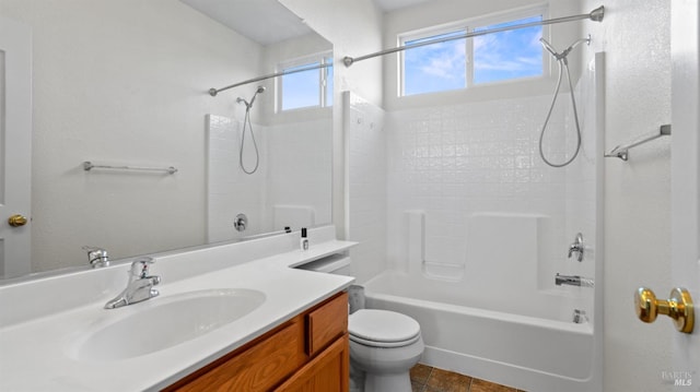 full bathroom with vanity, toilet, and shower / washtub combination