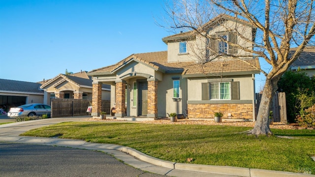 view of front of property featuring a front yard