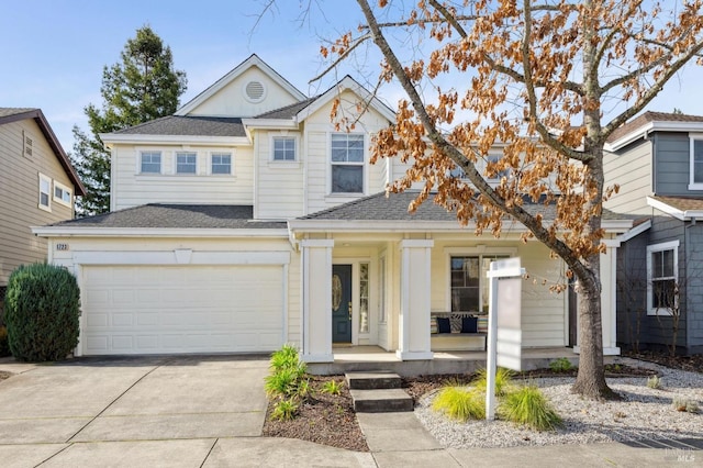 view of front of house with a garage and covered porch