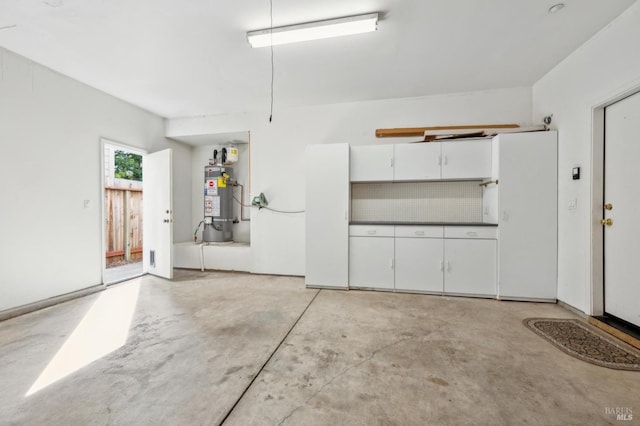 garage featuring water heater