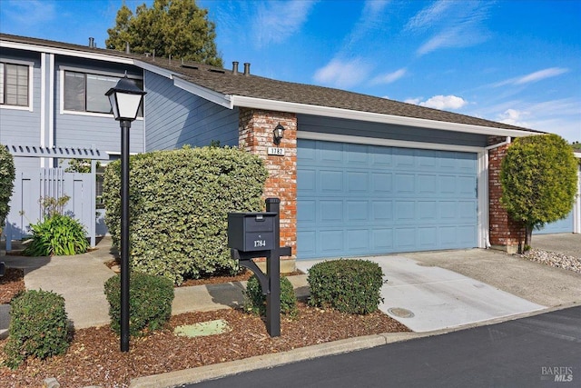 1782 Devonshire Dr, Benicia, CA 94510 - view of front of home with driveway, an attached garage, and brick siding
