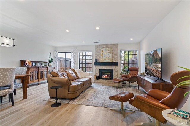 1782 Devonshire Dr, Benicia, CA 94510 - living area with wood finished floors, a fireplace, and recessed lighting