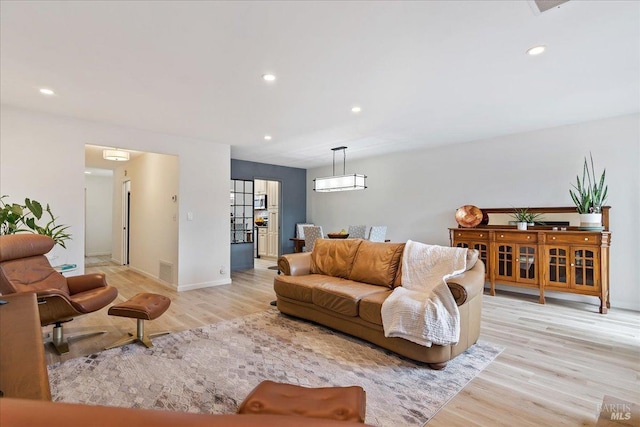 1782 Devonshire Dr, Benicia, CA 94510 - living area featuring light wood-style flooring, recessed lighting, and baseboards