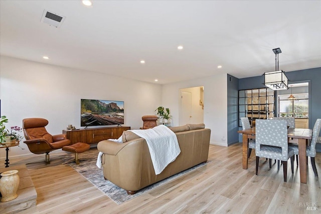 1782 Devonshire Dr, Benicia, CA 94510 - living area with light wood finished floors, recessed lighting, and baseboards