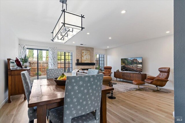 1782 Devonshire Dr, Benicia, CA 94510 - kitchen featuring appliances with stainless steel finishes, decorative backsplash, light wood finished floors, recessed lighting, and ornamental molding