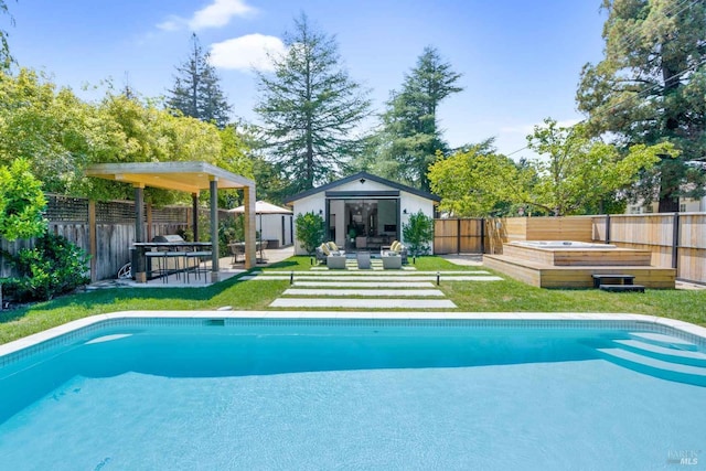 view of swimming pool with an outdoor living space, an outdoor structure, and a jacuzzi