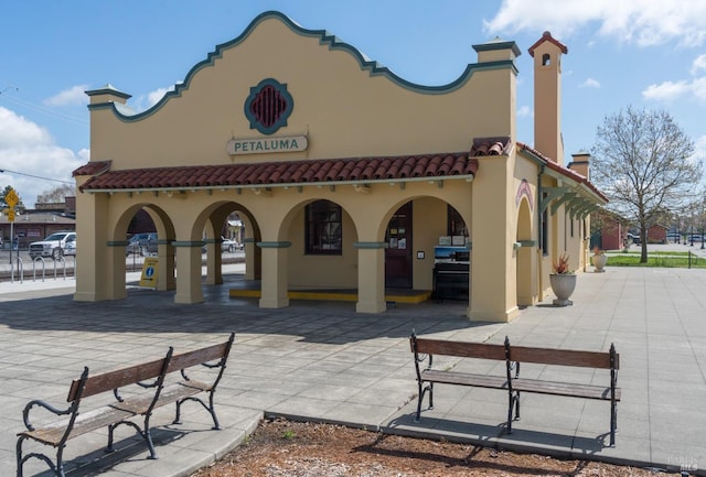 view of home's community featuring a patio