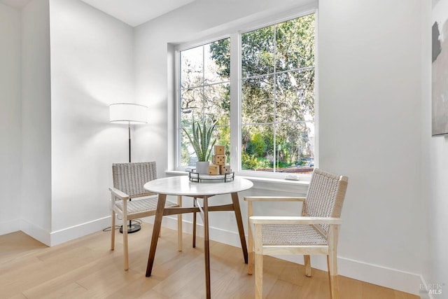 sitting room featuring light hardwood / wood-style flooring