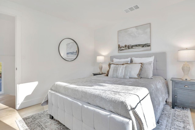 bedroom with light hardwood / wood-style flooring