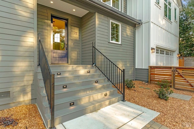 doorway to property featuring a garage