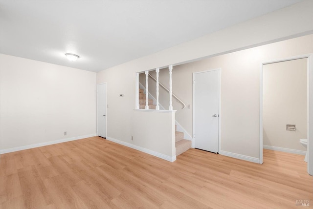 basement featuring light hardwood / wood-style flooring