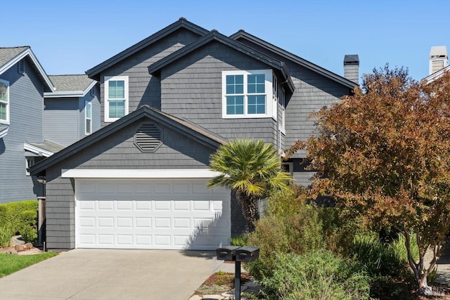 view of front of home with a garage