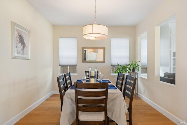 dining room featuring light hardwood / wood-style flooring