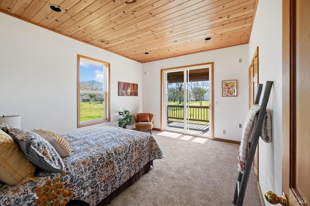 bedroom with access to exterior, wood ceiling, and carpet