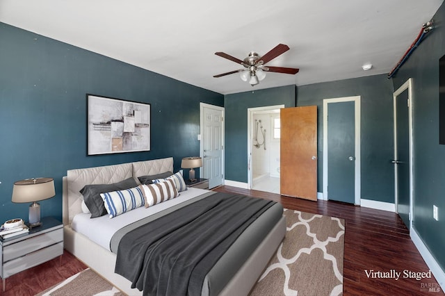 bedroom featuring dark wood-type flooring and ceiling fan