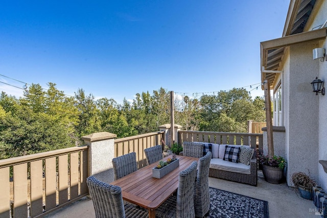 wooden deck with an outdoor hangout area