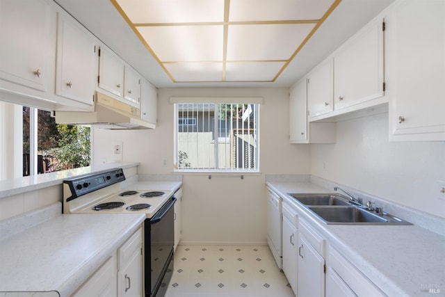 kitchen featuring white cabinets, white dishwasher, sink, and range with electric stovetop