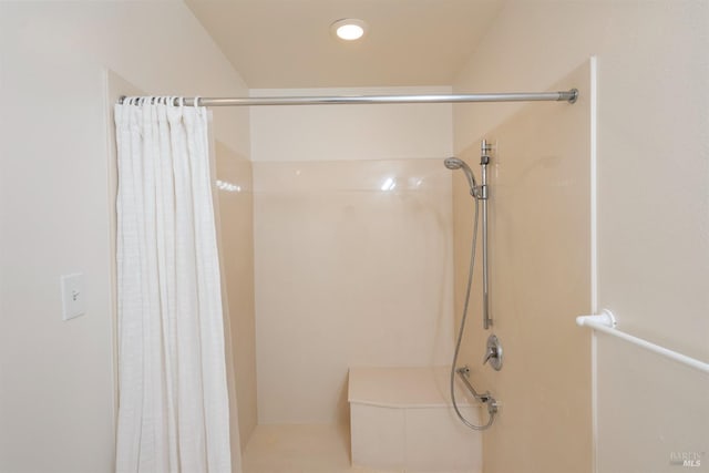 bathroom featuring walk in shower