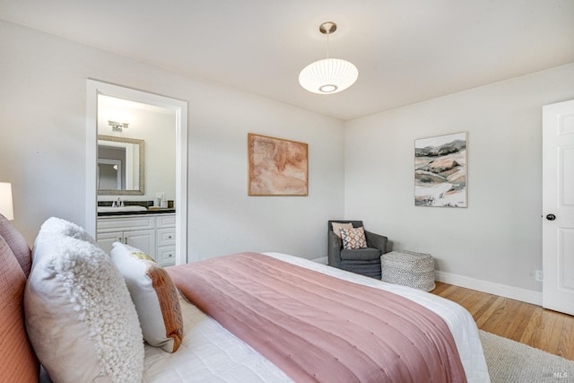 1077 Valley View St, Saint Helena, CA 94574 - bedroom featuring light wood-style flooring and ensuite bathroom